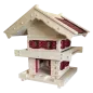 Preview: Rustikales Vogelfutterhaus aus hellem Holz im alpinen Blockhaus-Stil mit rotem Schindeldach und Fensterläden