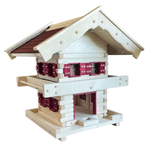 Preview: Rustikale zweistöckige Vogelvilla im Blockhaus-Stil aus hellem Fichtenholz mit rotem Schindeldach und dekorativen Fensterläden