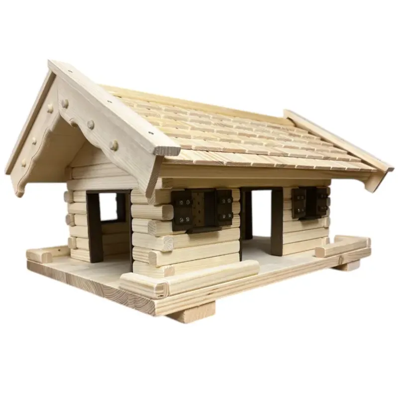 vogelhaus-middel-kleine-holzschindeln-dunkelbraun-gebeizte-türen-fensterzargen-fensterlaeden-boden-mit-zaun vogelhaus-middel-kleine-holzschindeln-dunkelbraun-gebeizte-türen-fensterzargen-fensterlaeden-boden-mit-zaun