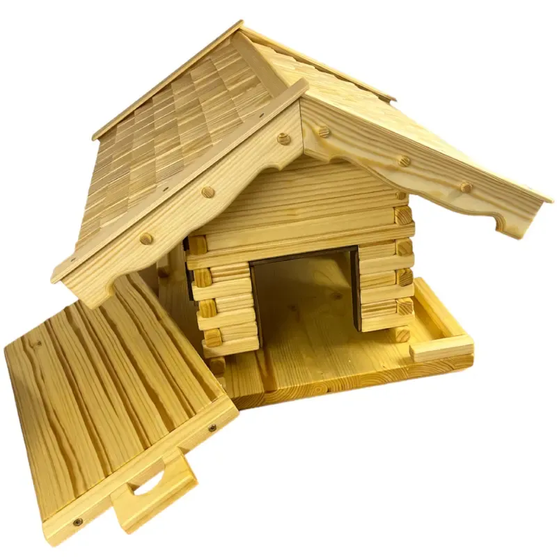 xxl-vogelhaus-groot-kleinen-holzschindeln-dunkelbraun-gebeizte-fensterlaeden-tueren-fensterzargen-ausziehboden-boden-mit-zaun